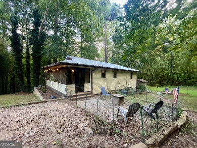 Cottage in the woods located in Turtle Cove! This ranch home on Turtle Cove Golf Course in Georgia - for sale on GolfHomes.com, golf home, golf lot
