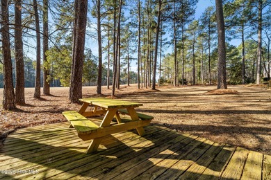Experience modern living in this contemporary split-level home on Deercroft Golf and Country Club in North Carolina - for sale on GolfHomes.com, golf home, golf lot