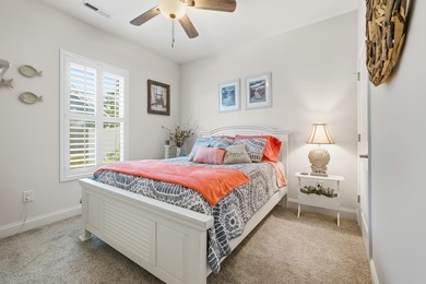 Experience the ease of coastal living in this impeccably on Surf Golf and Beach Club in South Carolina - for sale on GolfHomes.com, golf home, golf lot