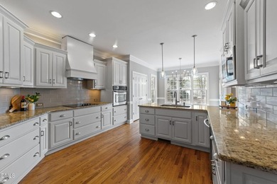 Beautiful golf course home located on the 13th green of desired on The Neuse Golf Club in North Carolina - for sale on GolfHomes.com, golf home, golf lot