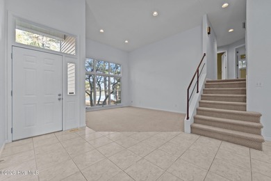 Experience modern living in this contemporary split-level home on Deercroft Golf and Country Club in North Carolina - for sale on GolfHomes.com, golf home, golf lot