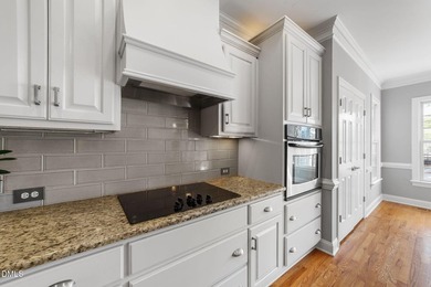 Beautiful golf course home located on the 13th green of desired on The Neuse Golf Club in North Carolina - for sale on GolfHomes.com, golf home, golf lot