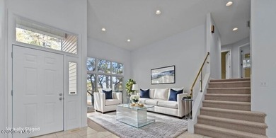 Experience modern living in this contemporary split-level home on Deercroft Golf and Country Club in North Carolina - for sale on GolfHomes.com, golf home, golf lot