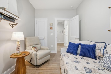 Experience the ease of coastal living in this impeccably on Surf Golf and Beach Club in South Carolina - for sale on GolfHomes.com, golf home, golf lot