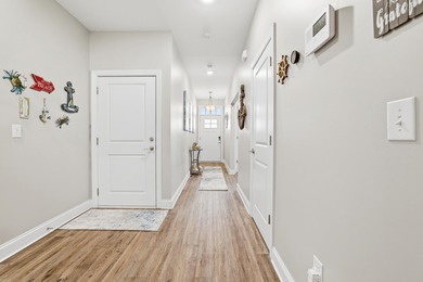 Experience the ease of coastal living in this impeccably on Surf Golf and Beach Club in South Carolina - for sale on GolfHomes.com, golf home, golf lot