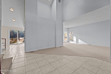 Experience modern living in this contemporary split-level home on Deercroft Golf and Country Club in North Carolina - for sale on GolfHomes.com, golf home, golf lot