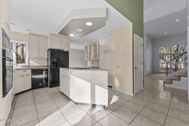 Experience modern living in this contemporary split-level home on Deercroft Golf and Country Club in North Carolina - for sale on GolfHomes.com, golf home, golf lot