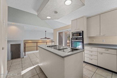 Experience modern living in this contemporary split-level home on Deercroft Golf and Country Club in North Carolina - for sale on GolfHomes.com, golf home, golf lot