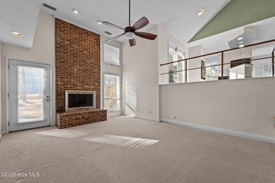 Experience modern living in this contemporary split-level home on Deercroft Golf and Country Club in North Carolina - for sale on GolfHomes.com, golf home, golf lot