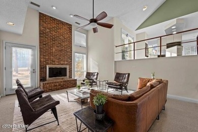 Experience modern living in this contemporary split-level home on Deercroft Golf and Country Club in North Carolina - for sale on GolfHomes.com, golf home, golf lot