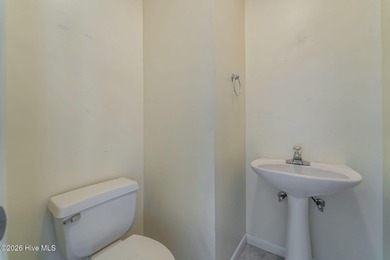 Experience modern living in this contemporary split-level home on Deercroft Golf and Country Club in North Carolina - for sale on GolfHomes.com, golf home, golf lot