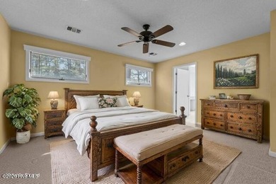 Experience modern living in this contemporary split-level home on Deercroft Golf and Country Club in North Carolina - for sale on GolfHomes.com, golf home, golf lot