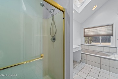 Experience modern living in this contemporary split-level home on Deercroft Golf and Country Club in North Carolina - for sale on GolfHomes.com, golf home, golf lot