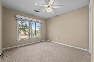 Experience modern living in this contemporary split-level home on Deercroft Golf and Country Club in North Carolina - for sale on GolfHomes.com, golf home, golf lot