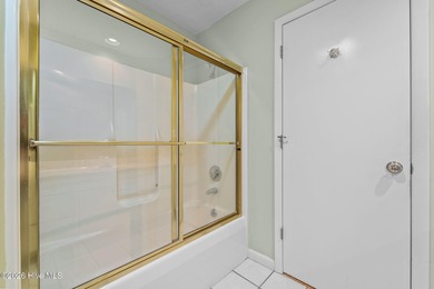 Experience modern living in this contemporary split-level home on Deercroft Golf and Country Club in North Carolina - for sale on GolfHomes.com, golf home, golf lot