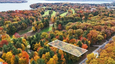 Located in the heart of Leland, this vacant parcel is one of a on Leland Country Club in Michigan - for sale on GolfHomes.com, golf home, golf lot