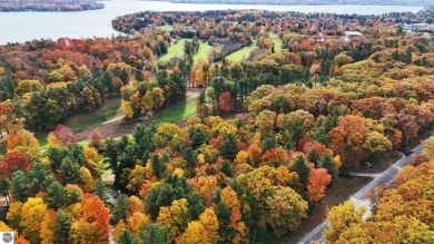 Located in the heart of Leland, this vacant parcel is one of a on Leland Country Club in Michigan - for sale on GolfHomes.com, golf home, golf lot