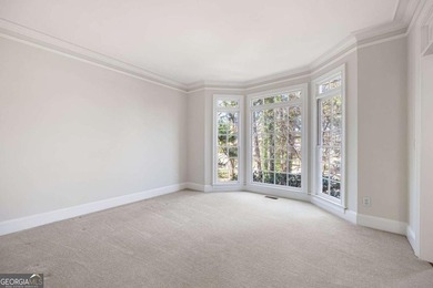 Tucked away on a quiet, double cul-de-sac street in Brookstone on Brookstone Golf and Country Club in Georgia - for sale on GolfHomes.com, golf home, golf lot