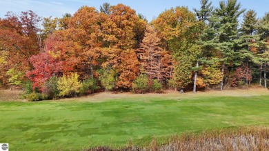 Located in the heart of Leland, this vacant parcel is one of a on Leland Country Club in Michigan - for sale on GolfHomes.com, golf home, golf lot