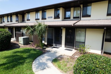 Don't miss this rare opportunity to own a light-filled on Palm Harbor Golf Club in Florida - for sale on GolfHomes.com, golf home, golf lot
