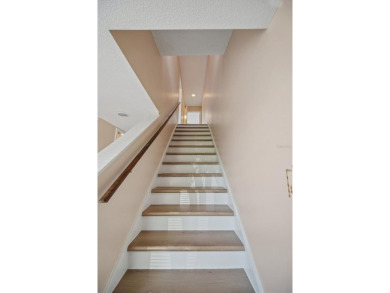 Don't miss this rare opportunity to own a light-filled on Palm Harbor Golf Club in Florida - for sale on GolfHomes.com, golf home, golf lot