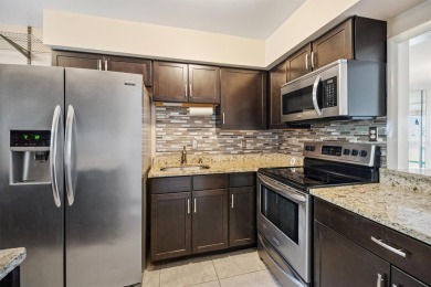 Don't miss this rare opportunity to own a light-filled on Palm Harbor Golf Club in Florida - for sale on GolfHomes.com, golf home, golf lot