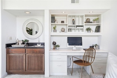 WOW. The door opens, and your attention is immediately drawn on Rancho San Joaquin Golf Course in California - for sale on GolfHomes.com, golf home, golf lot