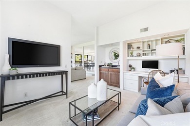 WOW. The door opens, and your attention is immediately drawn on Rancho San Joaquin Golf Course in California - for sale on GolfHomes.com, golf home, golf lot