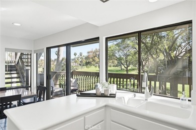 WOW. The door opens, and your attention is immediately drawn on Rancho San Joaquin Golf Course in California - for sale on GolfHomes.com, golf home, golf lot