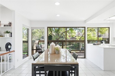 WOW. The door opens, and your attention is immediately drawn on Rancho San Joaquin Golf Course in California - for sale on GolfHomes.com, golf home, golf lot