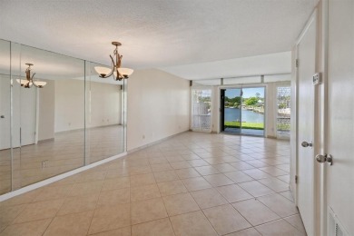 Don't miss this rare opportunity to own a light-filled on Palm Harbor Golf Club in Florida - for sale on GolfHomes.com, golf home, golf lot
