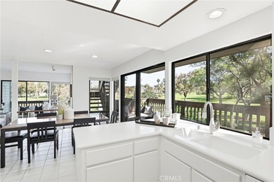 WOW. The door opens, and your attention is immediately drawn on Rancho San Joaquin Golf Course in California - for sale on GolfHomes.com, golf home, golf lot