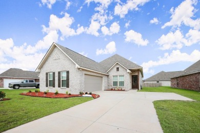 Situated in the prestigious Pelican Crossing subdivision on Pelican Point Golf Club in Louisiana - for sale on GolfHomes.com, golf home, golf lot