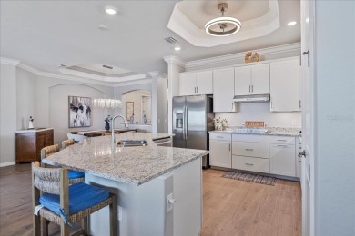 From the moment you step through the front door, this stunning on Heritage Landing Golf  in Florida - for sale on GolfHomes.com, golf home, golf lot