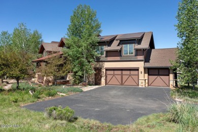 This stunning single-family residence offers 360-degree views of on Eagle Ranch in Colorado - for sale on GolfHomes.com, golf home, golf lot