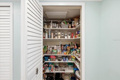 COASTAL RETREAT IN TREASURE ISLAND! Welcome to this on Treasure Bay Golf and Tennis in Florida - for sale on GolfHomes.com, golf home, golf lot