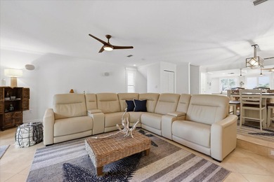 COASTAL RETREAT IN TREASURE ISLAND! Welcome to this on Treasure Bay Golf and Tennis in Florida - for sale on GolfHomes.com, golf home, golf lot