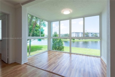 Beautiful apartment with lake front view in the lovely Pine on Pine Island Ridge Country Club in Florida - for sale on GolfHomes.com, golf home, golf lot
