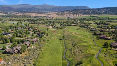 This stunning single-family residence offers 360-degree views of on Eagle Ranch in Colorado - for sale on GolfHomes.com, golf home, golf lot