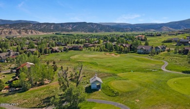 This stunning single-family residence offers 360-degree views of on Eagle Ranch in Colorado - for sale on GolfHomes.com, golf home, golf lot