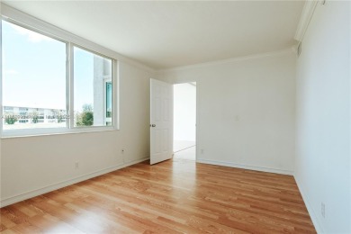 Beautiful apartment with lake front view in the lovely Pine on Pine Island Ridge Country Club in Florida - for sale on GolfHomes.com, golf home, golf lot