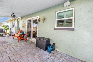 This spacious 4-bedroom, 2-bathroom pool home features a on Mangrove Bay Golf Course in Florida - for sale on GolfHomes.com, golf home, golf lot