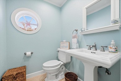 COASTAL RETREAT IN TREASURE ISLAND! Welcome to this on Treasure Bay Golf and Tennis in Florida - for sale on GolfHomes.com, golf home, golf lot