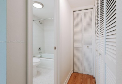 Beautiful apartment with lake front view in the lovely Pine on Pine Island Ridge Country Club in Florida - for sale on GolfHomes.com, golf home, golf lot
