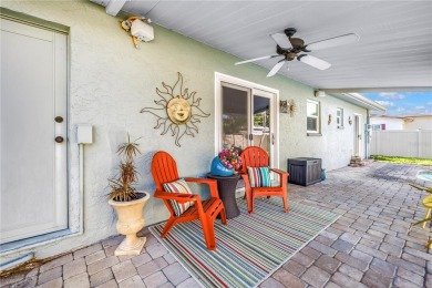 This spacious 4-bedroom, 2-bathroom pool home features a on Mangrove Bay Golf Course in Florida - for sale on GolfHomes.com, golf home, golf lot