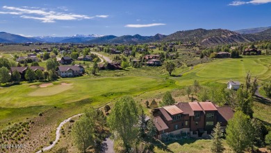 This stunning single-family residence offers 360-degree views of on Eagle Ranch in Colorado - for sale on GolfHomes.com, golf home, golf lot