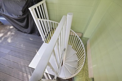 COASTAL RETREAT IN TREASURE ISLAND! Welcome to this on Treasure Bay Golf and Tennis in Florida - for sale on GolfHomes.com, golf home, golf lot