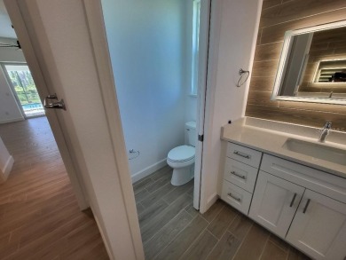 Brand new, JUST COMPLETED! 3/2/3 pool home. Easy ingress & on Pinemoor West Golf Club in Florida - for sale on GolfHomes.com, golf home, golf lot