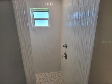 Brand new, JUST COMPLETED! 3/2/3 pool home. Easy ingress & on Pinemoor West Golf Club in Florida - for sale on GolfHomes.com, golf home, golf lot
