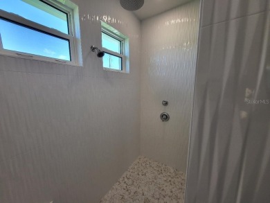 Brand new, JUST COMPLETED! 3/2/3 pool home. Easy ingress & on Pinemoor West Golf Club in Florida - for sale on GolfHomes.com, golf home, golf lot